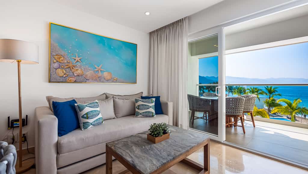 Ocean-view 1BR condo in Puerto Vallarta with pool, gym and balcony.