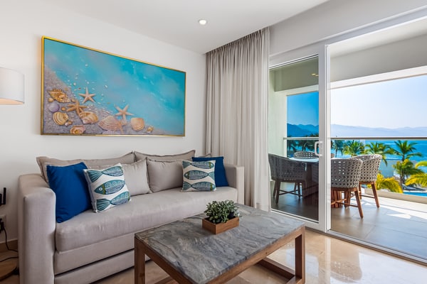 Ocean-view 1BR condo in Puerto Vallarta with pool, gym and balcony.