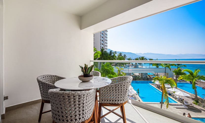 Ocean-view 1BR condo in Puerto Vallarta with pool, gym and balcony.