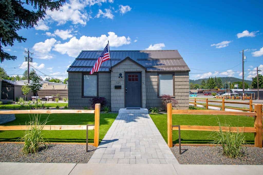 Two Private Cottages, One Shared Backyard—Perfect for Groups Who Want Space & Connection

Your private gateway to downtown Coeur d'Alene starts here: two fully independent side-by-side cottages with zero shared walls, each with its own kitchen, bathroom, and entrance. Sleep 8 guests across 3 bedrooms while maintaining the independence every group craves. Blocks from restaurants, under 15 minutes' walk to City Beach, and a shared fire pit where both families naturally gather each evening. This is group travel solved.