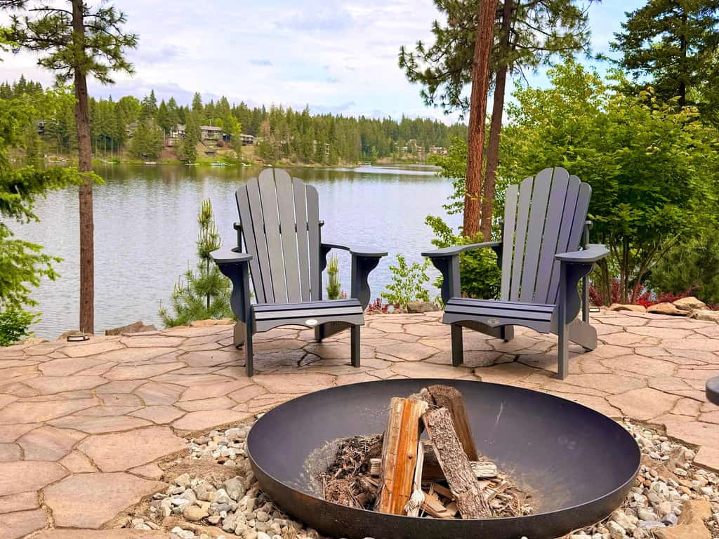 Enjoy a quiet stay surrounded by towering pines and the natural beauty of Avondale Lake in this brand-new 720-square-foot, single-level home. This private 2-bedroom, 1-bathroom retreat sits on nearly an acre and offers your own entrance, dock, and outdoor space. Spend the day paddleboarding, kayaking, or fishing on the non-motorized lake, then relax in the hot tub or gather around the fire pit while watching for deer and eagles. With modern comforts, nearby golf and dining, and complimentary Tour CDA perks, it’s an ideal North Idaho getaway!