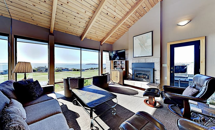 Soak in your private hot tub as the sun sets over Bodega Bay, then retreat to the cedar sauna for total relaxation. This 5-bedroom home perches above The Links golf course with sweeping ocean views from nearly every room. Room for 10 guests across three levels. Just a 10-minute walk to Doran Beach's protected sands and 5 minutes to the golf course. Mornings here start with coffee on the deck, watching the fog lift to reveal the Pacific stretching endlessly before you.