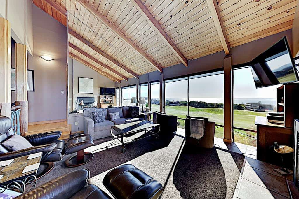Soak in your private hot tub as the sun sets over Bodega Bay, then retreat to the cedar sauna for total relaxation. This 5-bedroom home perches above The Links golf course with sweeping ocean views from nearly every room. Room for 10 guests across three levels. Just a 10-minute walk to Doran Beach's protected sands and 5 minutes to the golf course. Mornings here start with coffee on the deck, watching the fog lift to reveal the Pacific stretching endlessly before you.