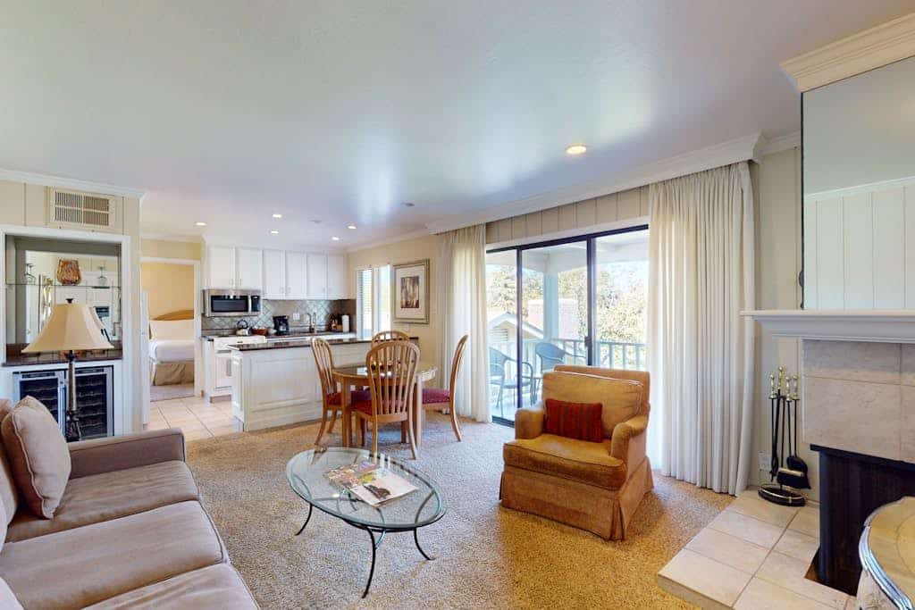 Morning light spills across the golf course from your private balcony, where two wicker chairs wait for your coffee ritual. This second-floor retreat puts you steps from Silverado's restaurants and spa, with a cozy fireplace for wine-country evenings. Sleeps 2 in the king suite. Just 0.1 miles to Silverado Market & Bakery, 0.7 miles to Del Dotto's wine caves. Your gateway to exploring 400+ Napa Valley wineries along the famous Silverado Trail.