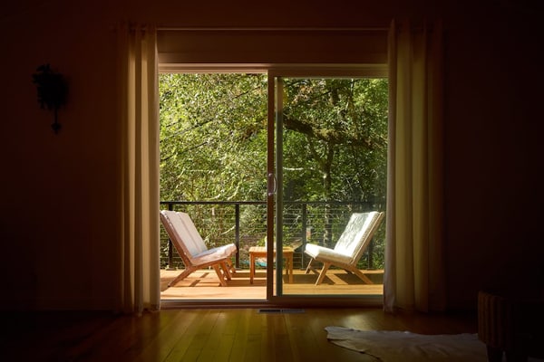 Step through sliding glass doors onto your private deck surrounded by towering redwoods. This stylish 3-bedroom retreat sleeps 6 in mid-century elegance. Just half a mile to Sunset Beach and the Russian River. Downtown Forestville's tasting rooms and Burke's Canoe Trips are minutes away. End your wine country days grilling under the stars while the redwoods whisper overhead — this is why you came to Sonoma County.