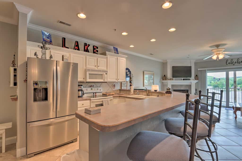 Balcony & Seasonal Pool: Lakefront Ozark Condo