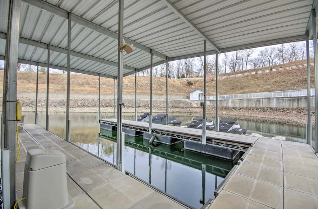 Boat Slip & Pool! Waterfront Lake Ozark Escape