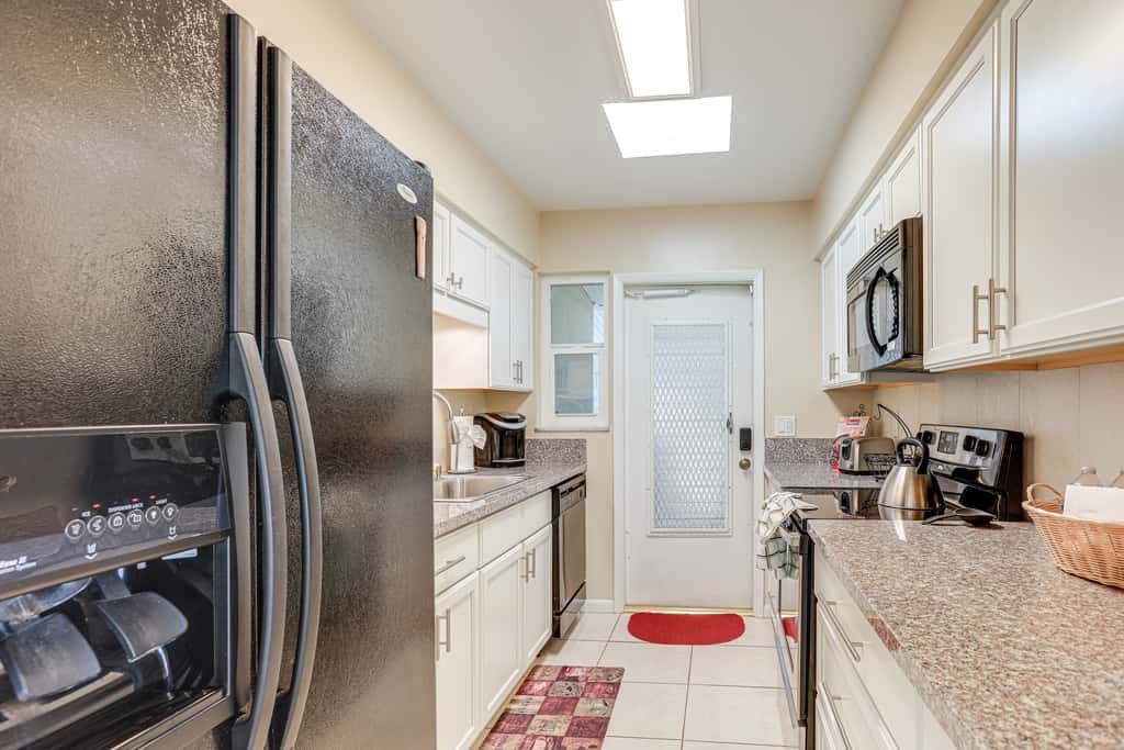 Sunny Port St Lucie Home: Lanai & Golf Course View