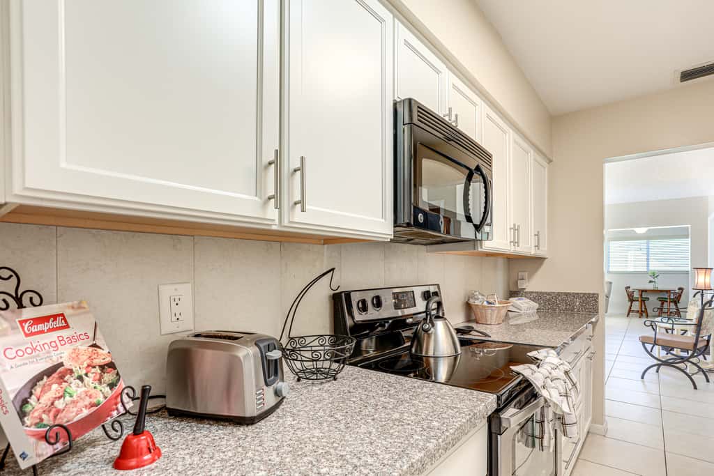 Sunny Port St Lucie Home: Lanai & Golf Course View