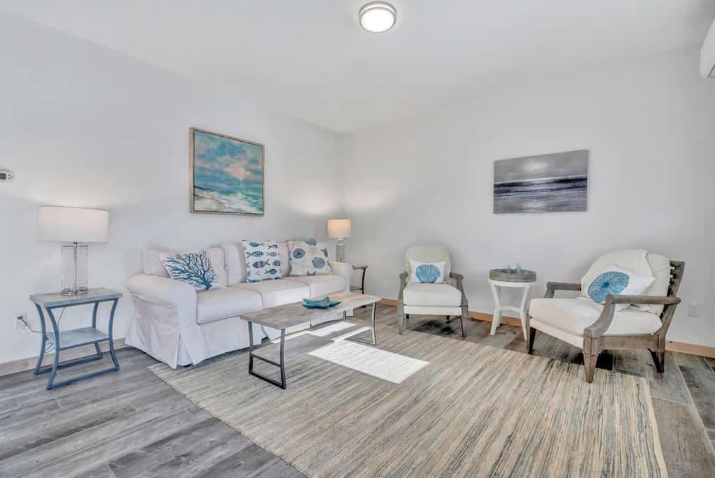Ocean Breeze West Ocean-view 3BR retreat with deck, WiFi, AC, and beach access