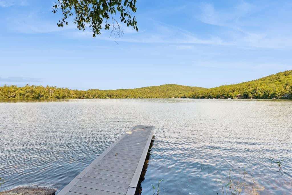 Secluded waterfront home with private dock, outdoor dining, firepit, WiFi & W/D