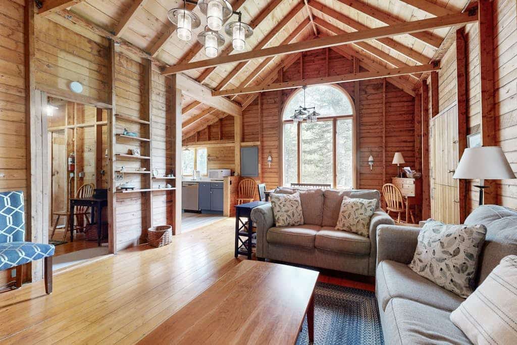 River view home w/ lovely deck, views & fireplace