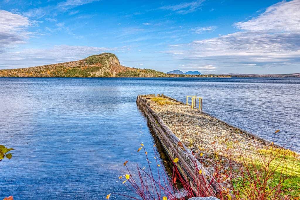 Charming condo w/ lake access, dock, WiFi & mountain views