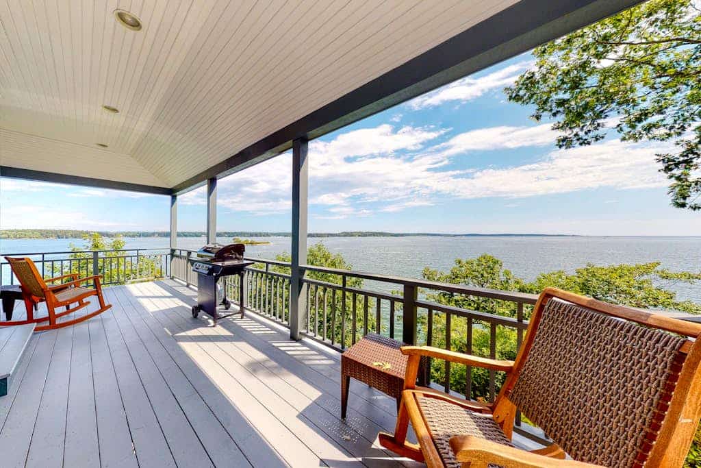 Delightful oceanfront home with amazing views, wrap-around deck & two fireplaces