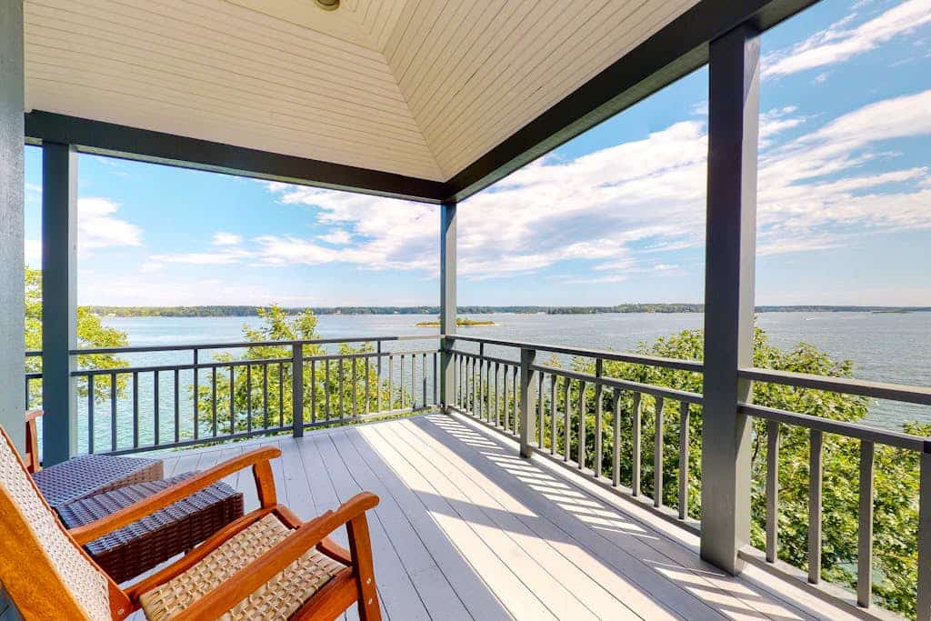 Delightful oceanfront home with amazing views, wrap-around deck & two fireplaces