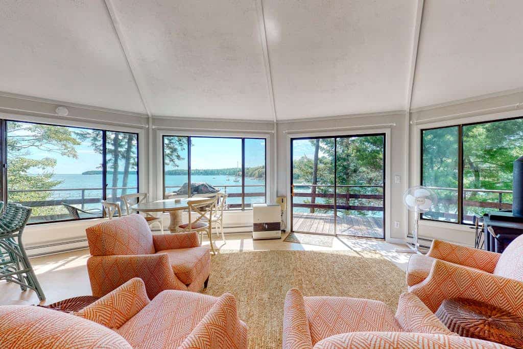 Unique oceanfront home with a deck, tons of natural light, & amazing views