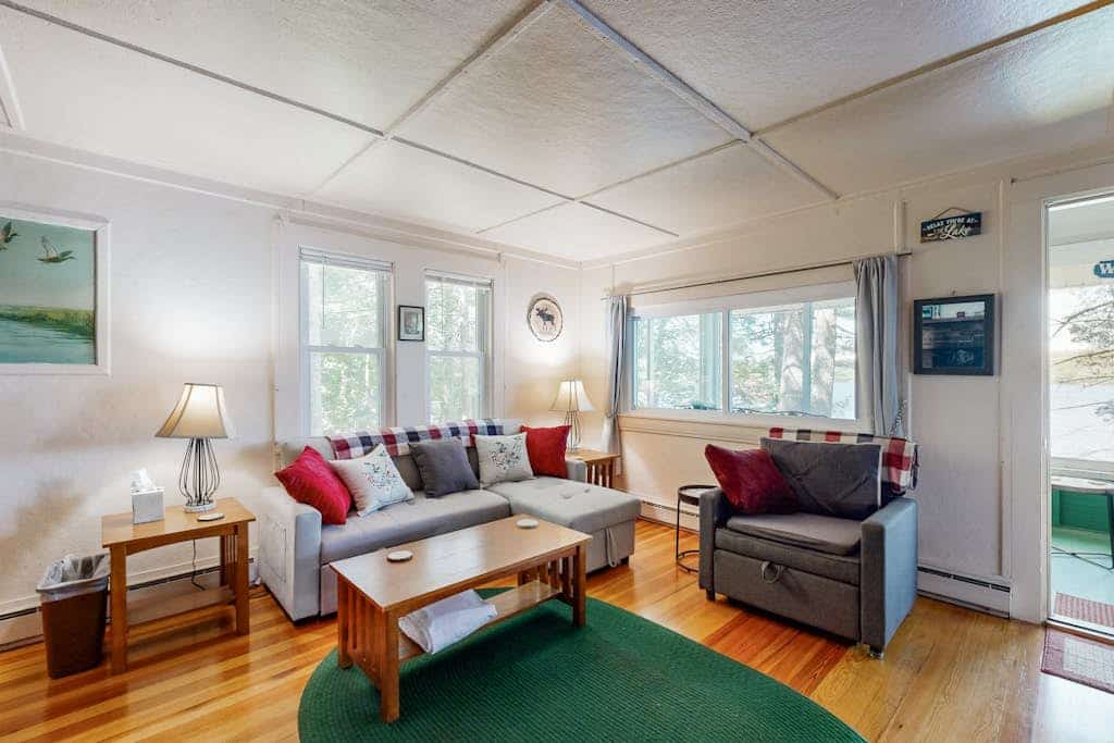 Lakefront cottage with dock, screened porch, & Island in Biscay Pond