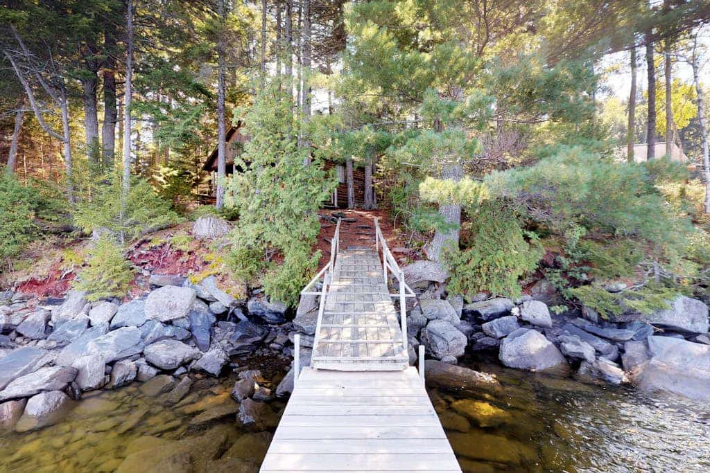 Lakefront cabin with private dock & beach access