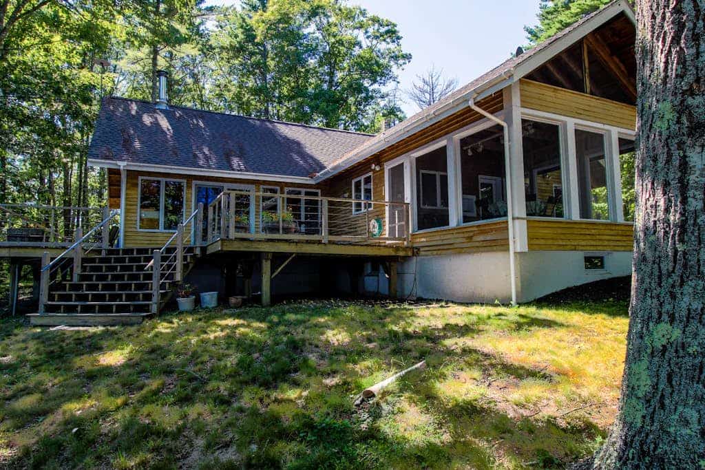 Private waterfront home with large deck & deep water dock
