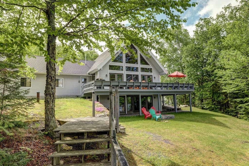 Lakefront Chalet-Style Home with Large Deck, a Dock & Beautiful Lake Views