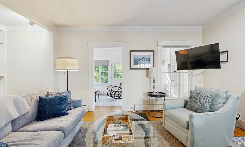 Historic home steps from the harbor with enclosed porches & gorgeous deck