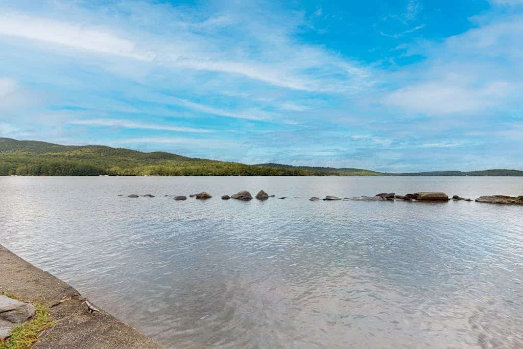 Lakefront Home with Private Dock, Pebble Beach & Enclosed Porch - Dogs Welcome