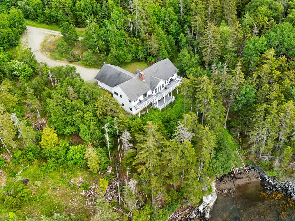 Comfortable bayfront home with beautiful views, large deck & on-site tennis