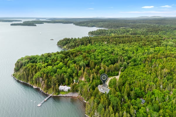 Comfortable bayfront home with beautiful views, large deck & on-site tennis
