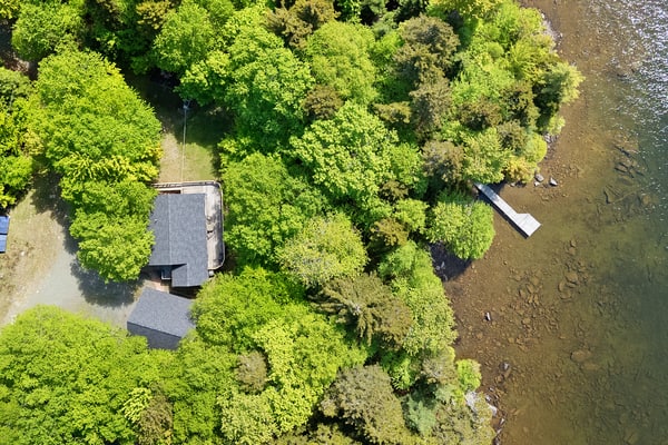 Waterfront cabin w/ outdoor firepit, dock, and lake views - dogs welcome