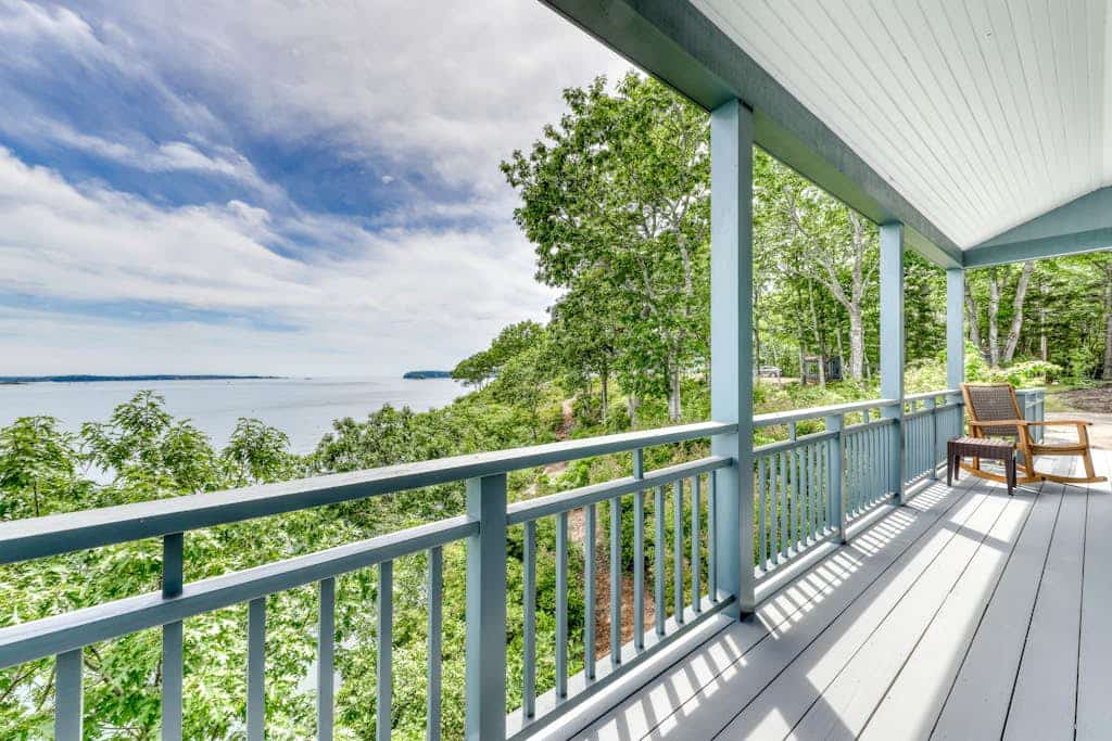 Delightful oceanfront home with amazing views, wrap-around deck & two fireplaces