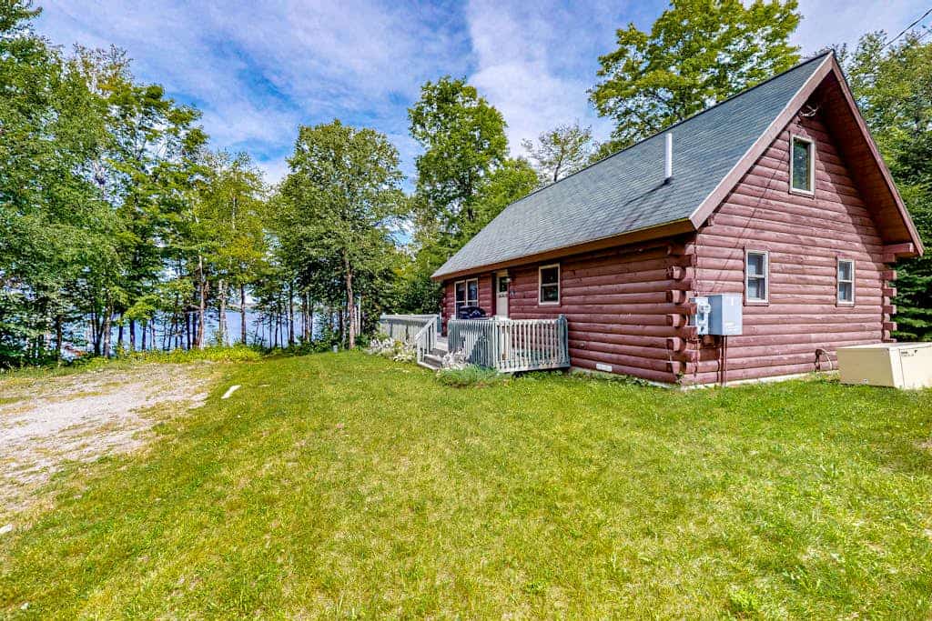 Lakefront cabin on First Roach Pond with dock, lake view & firepit- dog-friendly