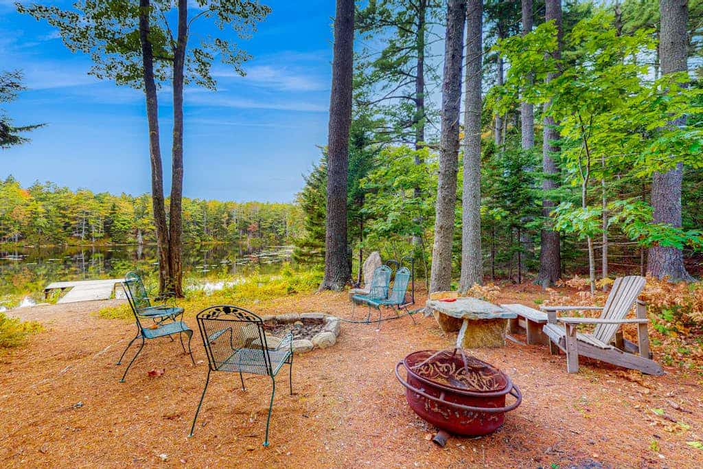 Appalachee Pond Waterfront Cottage | Decks, Sunroom, Dock with Kayaks & Canoe