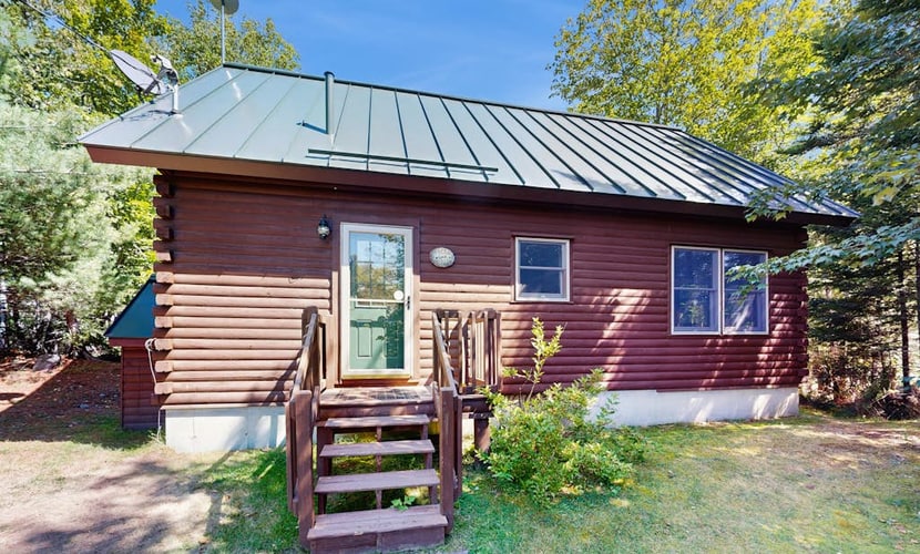 Dog-friendly lakefront home with deck, grill, WiFi, shared dock & water access