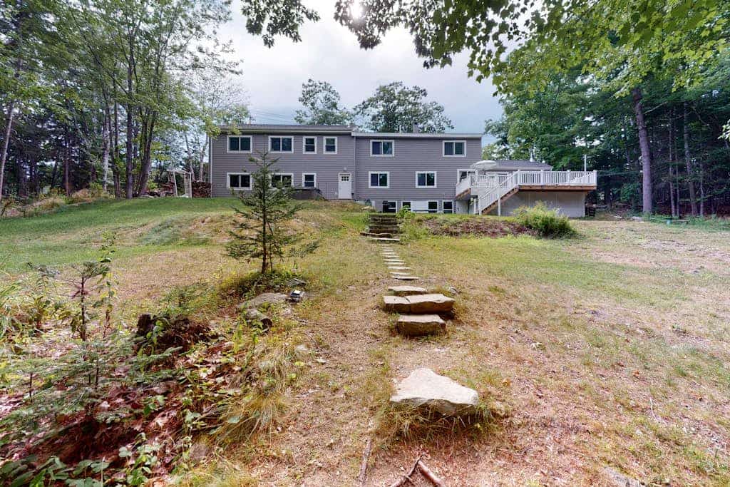 Waterfront home with deck, patio, grill, firepit, Ping-Pong, & WiFi