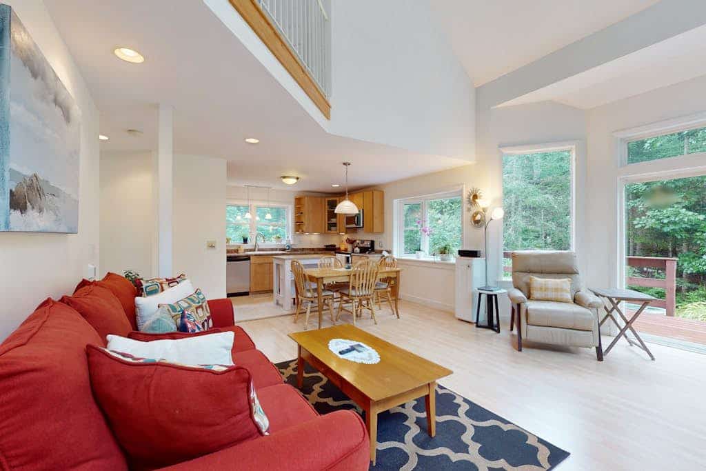 Sunny coastal retreat with deck, grill, beach, dock, & ocean access