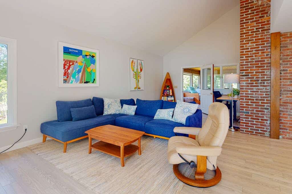 Water-view retreat with beach access, deck, grill, EV charger & lawn games