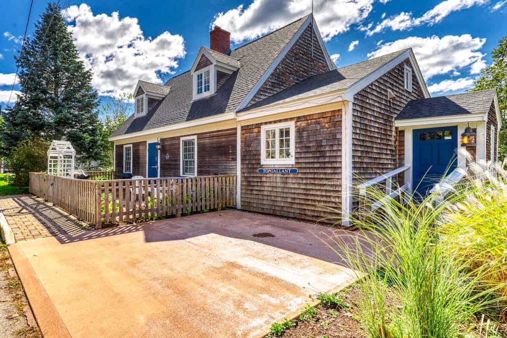 Elegant home right in town with gorgeous water view, deck & interior