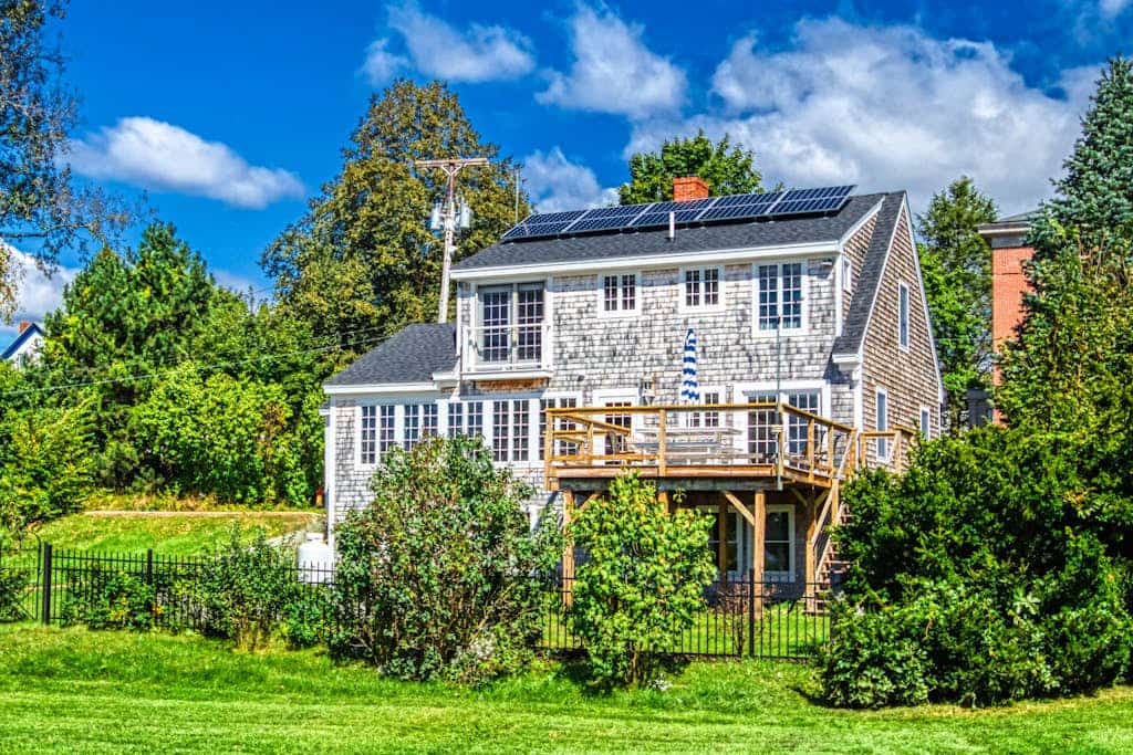 Elegant home right in town with gorgeous water view, deck & interior