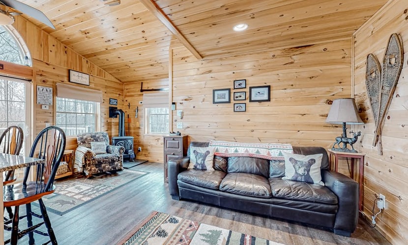 Lake-view two-story home with beach access, wood stove, grill, W/D, & fast WiFi