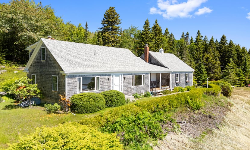 Dog-friendly oceanfront home with private shorefront, two fireplaces, & firepit