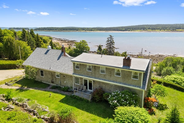 Dog-friendly oceanfront home with private shorefront, two fireplaces, & firepit