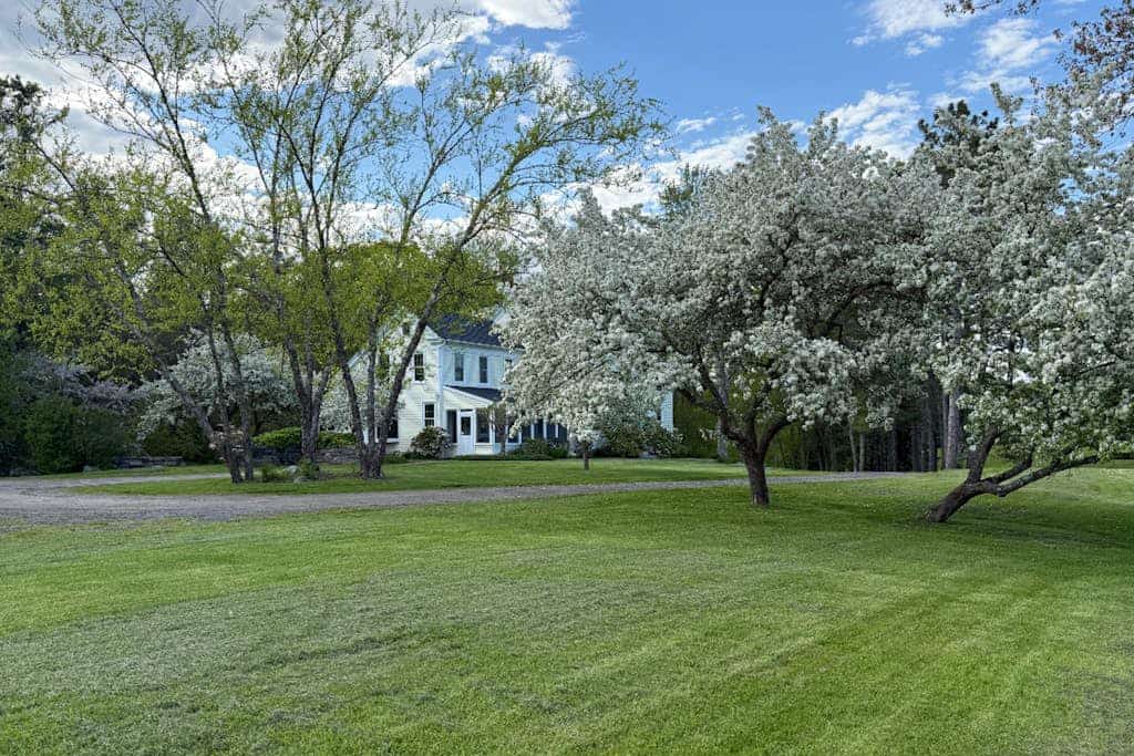 Renovated farmhouse on an acreage with grill, four-bedrooms, & W/D - river views
