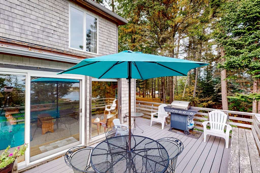 Dog-friendly 3-story home with wood stove, deck, grill, ocean views, W/D, AC