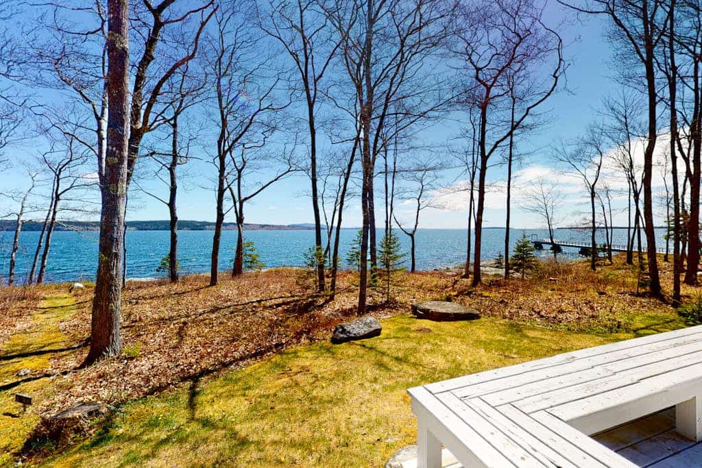 Oceanfront retreat with sunrise views, screened porch, & deck