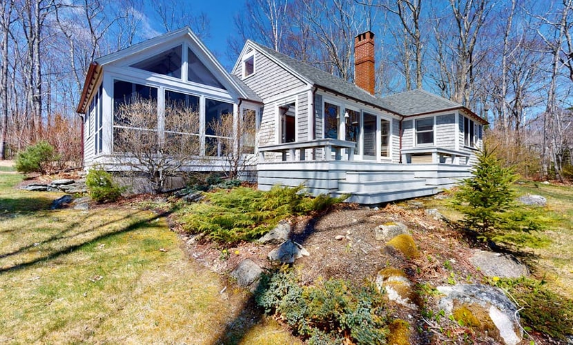 Oceanfront retreat with sunrise views, screened porch, & deck