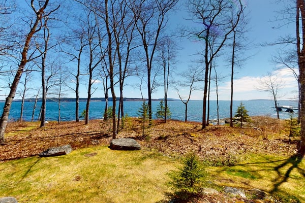 Oceanfront retreat with sunrise views, screened porch, & deck