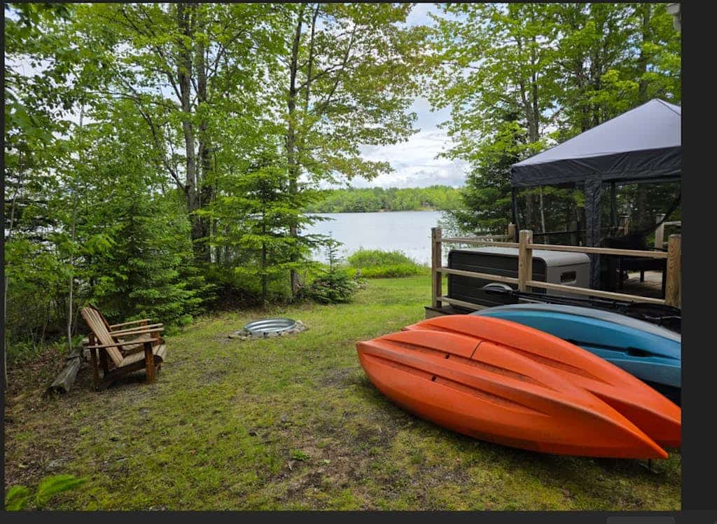 Waterfront home on Graham Lake with kayaks, bikes, firepit & fireplace