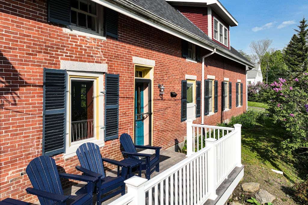 Elegant Victorian Gothic Revival home with wet bar, sunroom, & washer/dryer