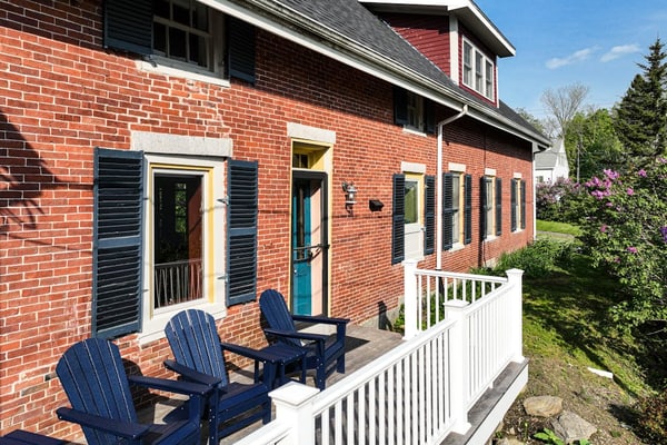 Elegant Victorian Gothic Revival home with wet bar, sunroom, & washer/dryer