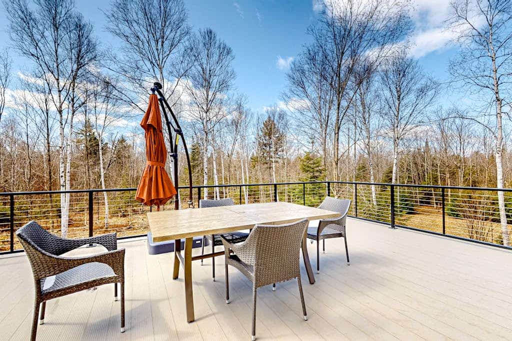 Dog-friendly apartment by Moosehead Lake with sprawling deck & firepit